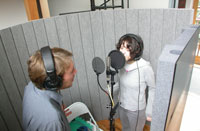 Thom and Nedelle singing in the Versipanel 'booth'